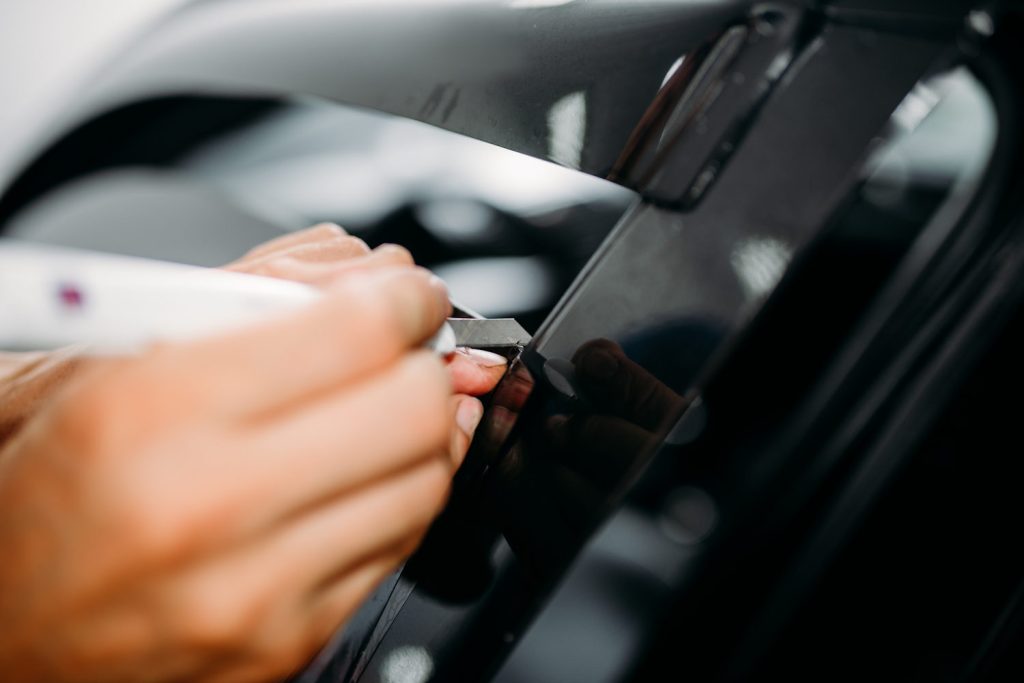 Owner cutting window tint