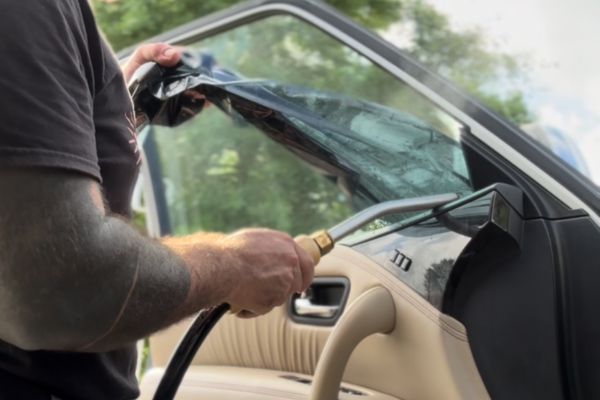 Removing old tint from a car window